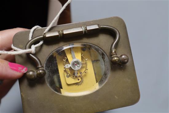 A brass mounted carriage timepiece and case